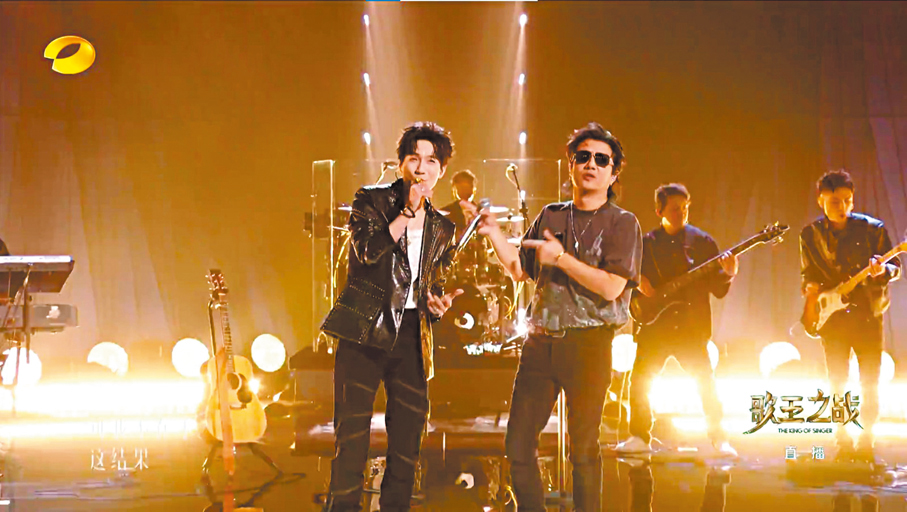 ●陳楚生與鄭鈞點燃現場。   視頻截圖