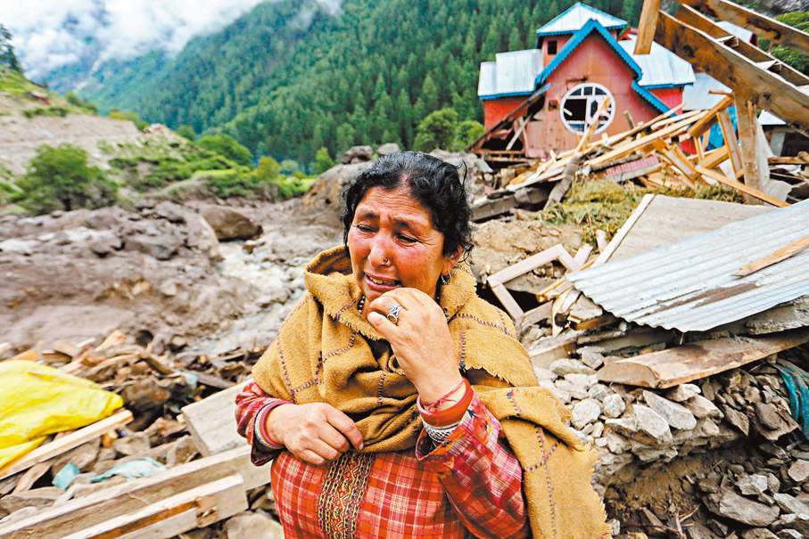 ●居民家園被毀，悲從中來。 法新社