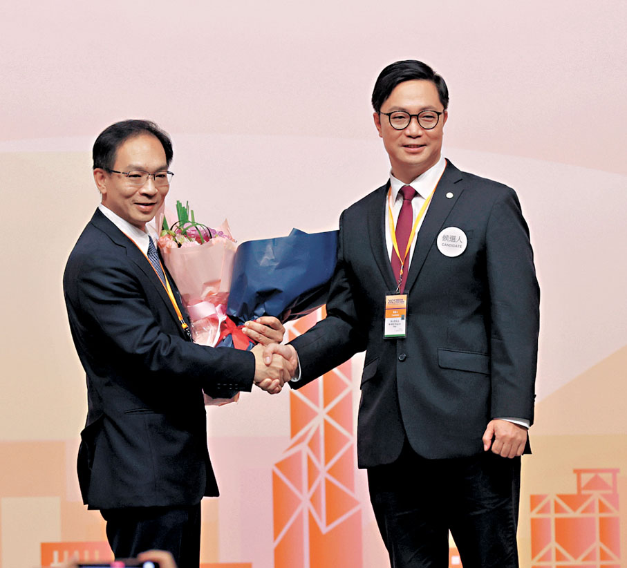 ●郭端祥（左）於商界（第三）界別當選。香港文匯報記者郭木又  攝