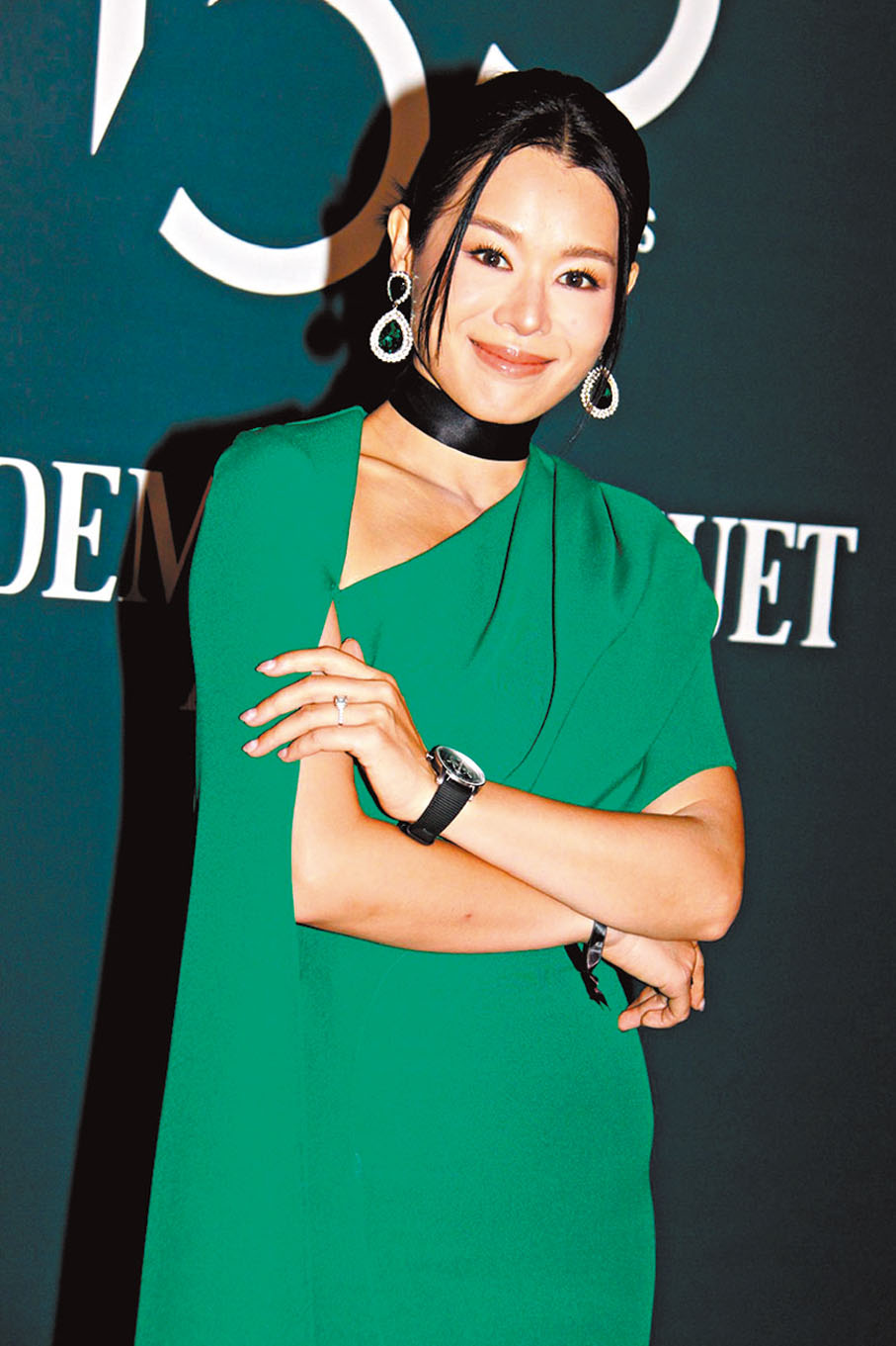 ●胡杏兒戴上老公的手錶赴會。 香港文匯報記者達里  攝