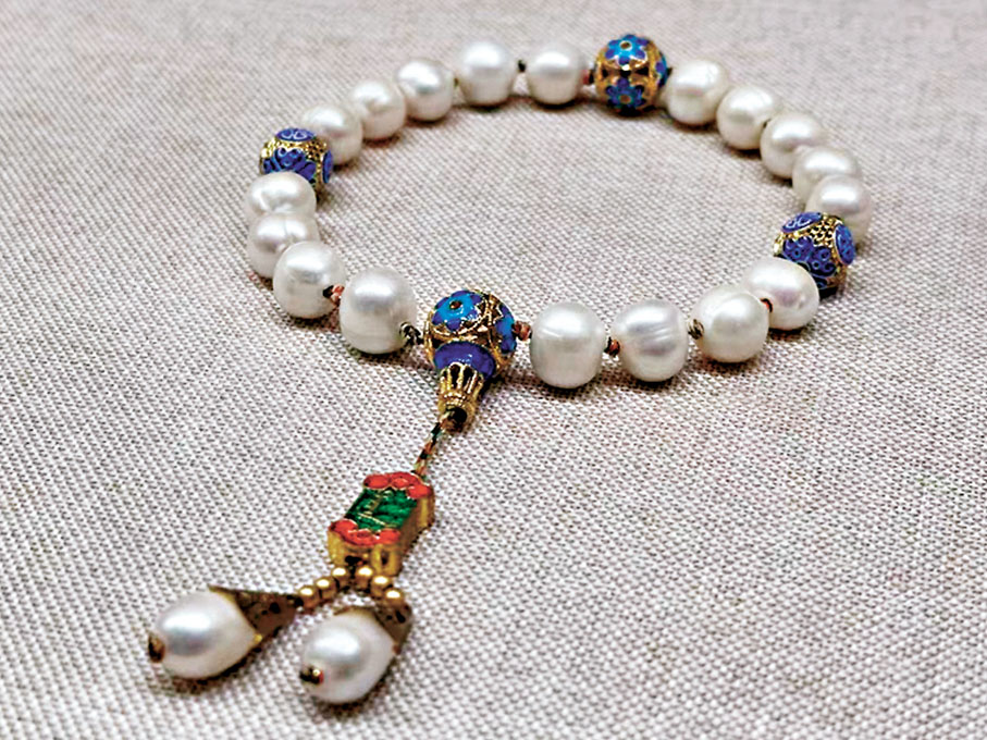 ●崔瑋曾歷時六年打造東珠十八子手持。