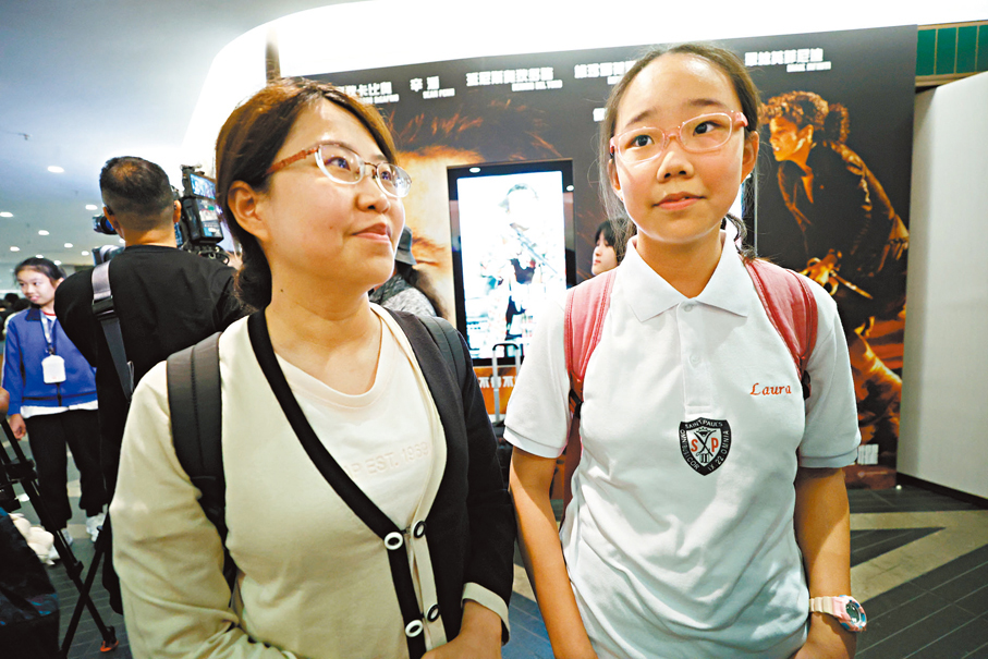 ●黎太及女兒黎同學。 香港文匯報記者萬霜靈  攝
