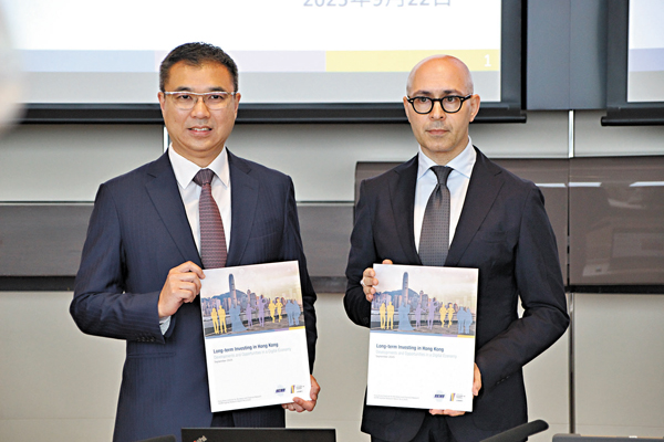 ●金融學院行政總裁兼香港貨幣及金融研究中心執行董事馮殷諾（左）和香港貨幣及金融研究中心主管衛頌飴。 香港文匯報記者黃艾力  攝 
