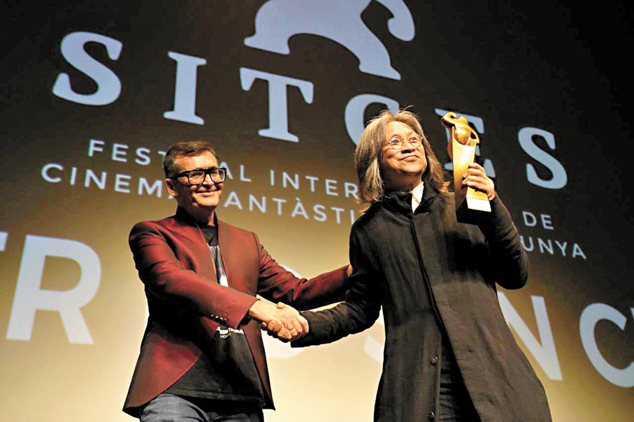 ●陳可辛(右)在第58屆錫切斯國際奇幻電影節中奪獎。