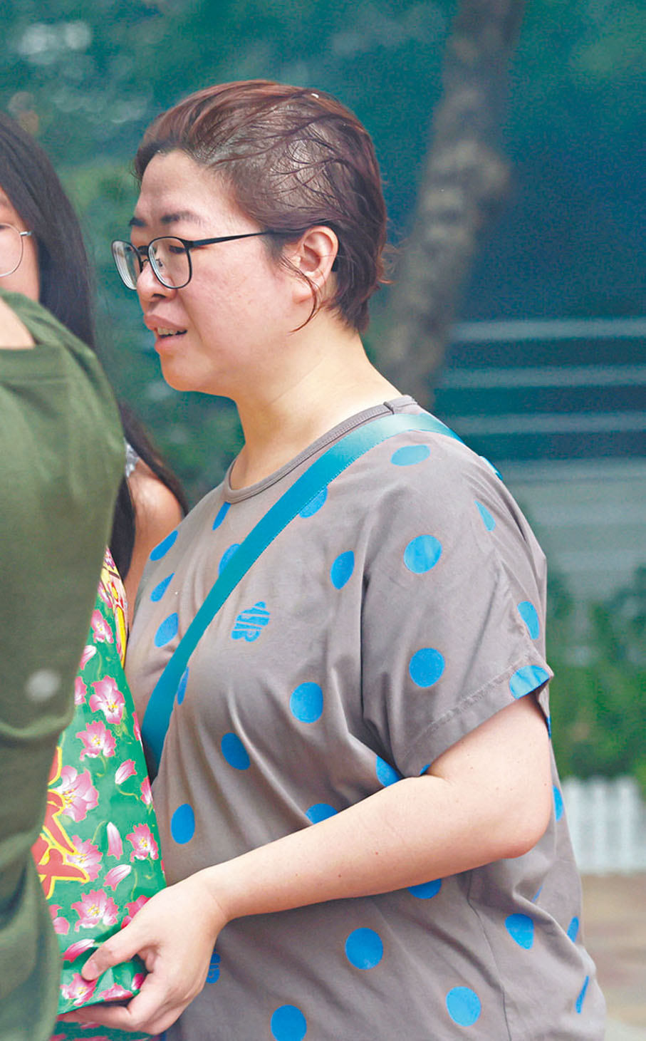 周小姐：花費近千元。她認為重點在於共同表達對先人的孝心與傳承。