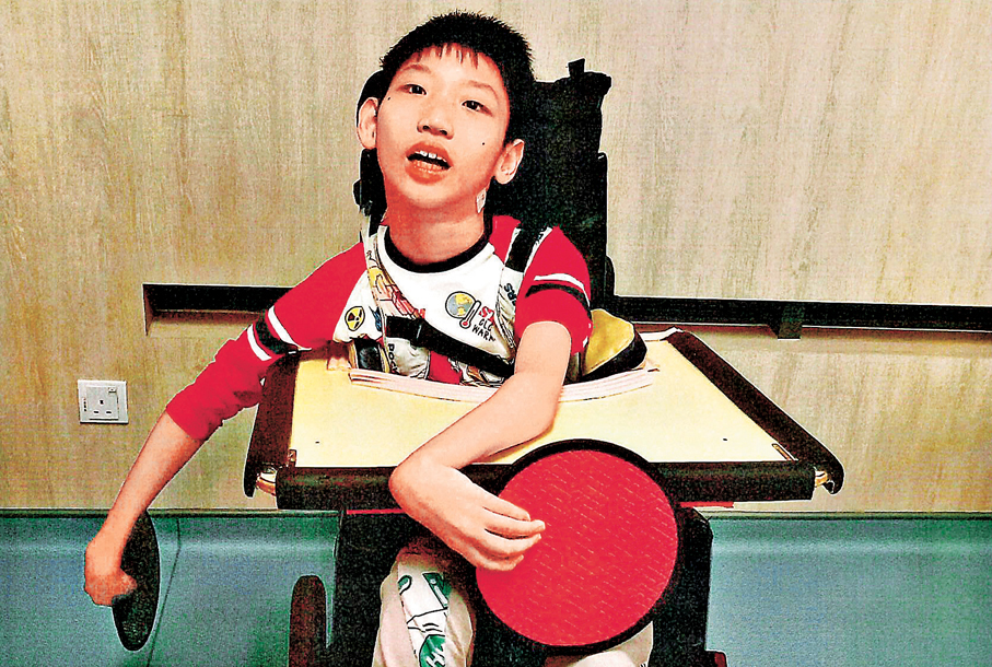 ●內地夫婦黎志堅及妻子多年前來港產子，其子出生後罹患腦癱及四肢殘障。 資料圖片