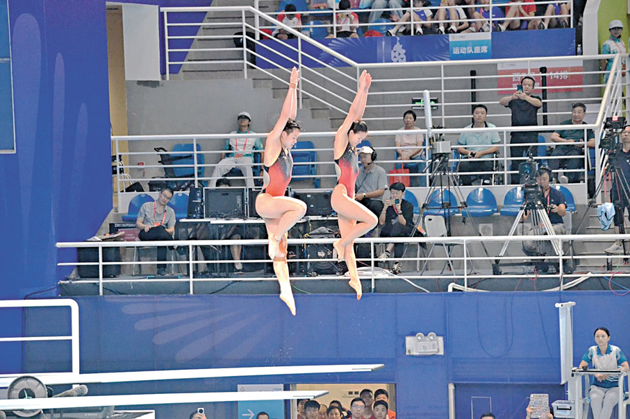 ●陳藝文/林珊奪冠，為廣東隊奪得跳水第五金。 香港文匯報記者敖敏輝  攝
