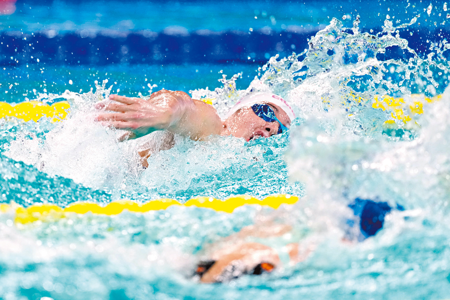 ●何詩蓓在100米自由泳強勢封后。 新華社