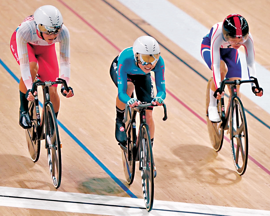 ●梁穎儀（中）在比賽中。  香港文匯報記者郭正謙  攝