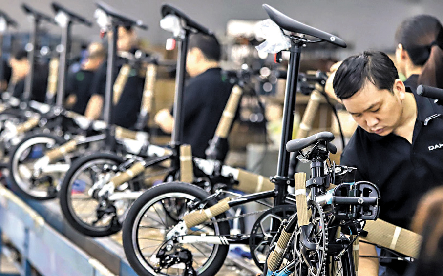 ●2024年大行銷量達22.64萬輛。圖為大行摺疊單車生產現場。 受訪者供圖