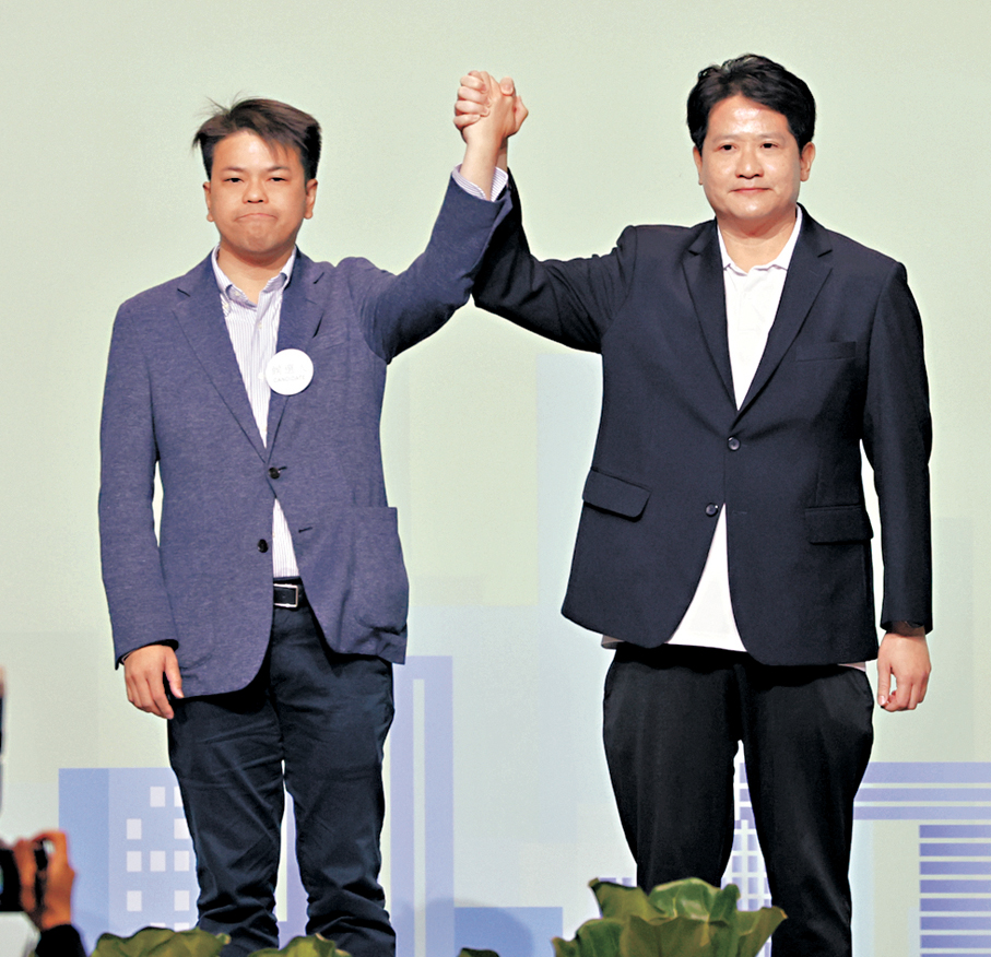 ●楊上進（左）與陳博智（右）惺惺相惜。香港文匯報記者北山彥  攝