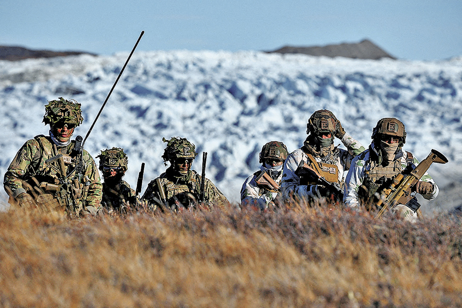 ●美國威脅向丹麥自治領地格陵蘭動武。圖為丹麥軍隊在格陵蘭巡邏。 資料圖片