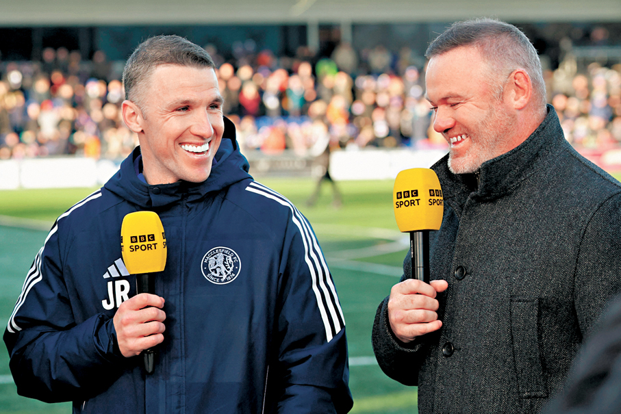 ●莊朗尼（左）接受哥哥朗尼訪問。 法新社