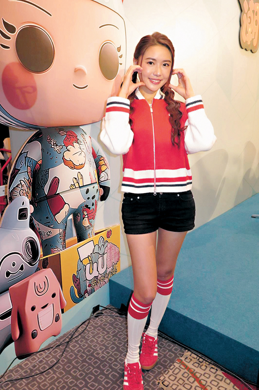 ●戴祖儀微笑比心。   香港文匯報記者阿祖  攝