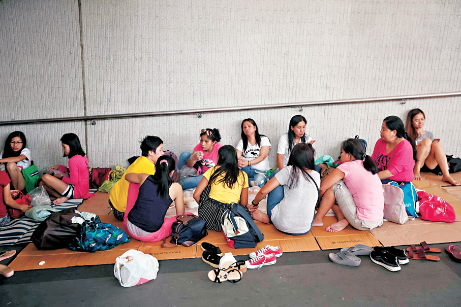 ●圖為在假日休息的外傭。 資料圖片