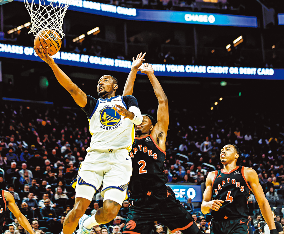 ●古明加（白衫）在比賽中。  美聯社