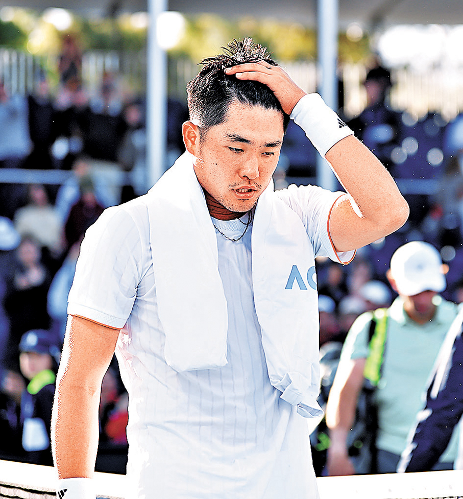 ●吳易昺在澳網次圈力戰而敗。 新華社