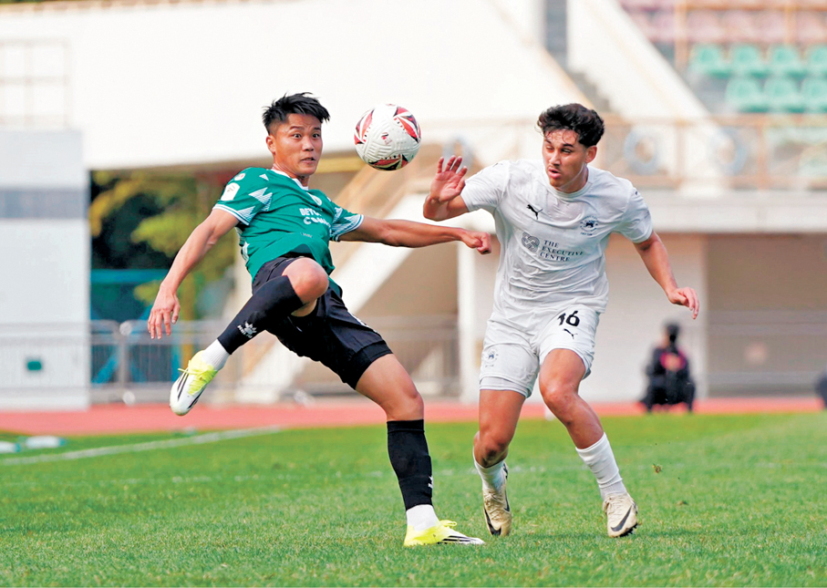 ●大埔（綠衫）順利擊敗港會。  香港文匯報記者張發兒  攝