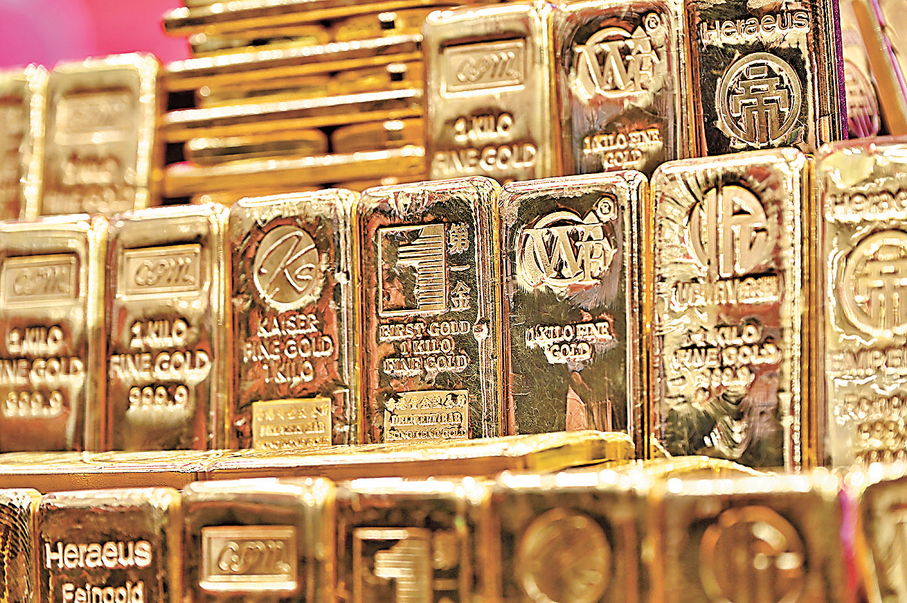 ●圖為香港黃金交易所展示黃金金條。 資料圖片