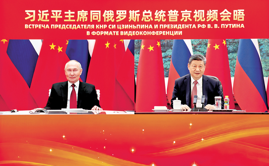  ●2月4日下午，國家主席習近平在北京人民大會堂同俄羅斯總統普京舉行視頻會晤。 新華社