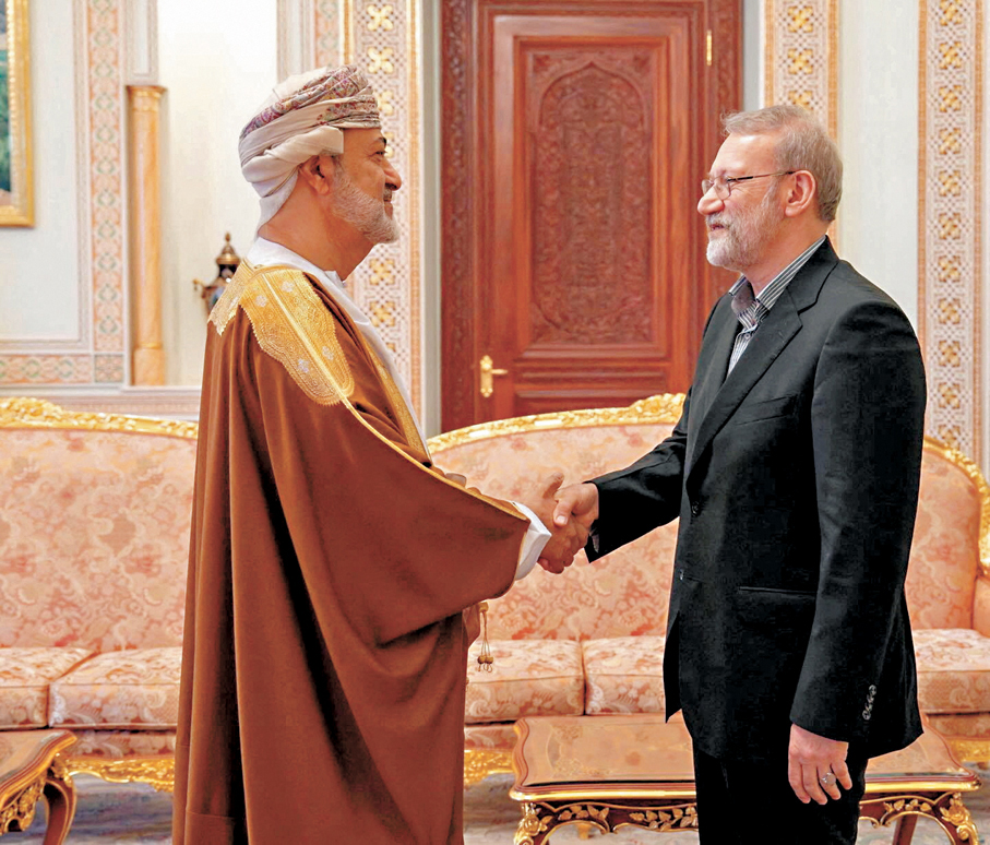 ●拉里賈尼（右）與海賽姆會面。路透社