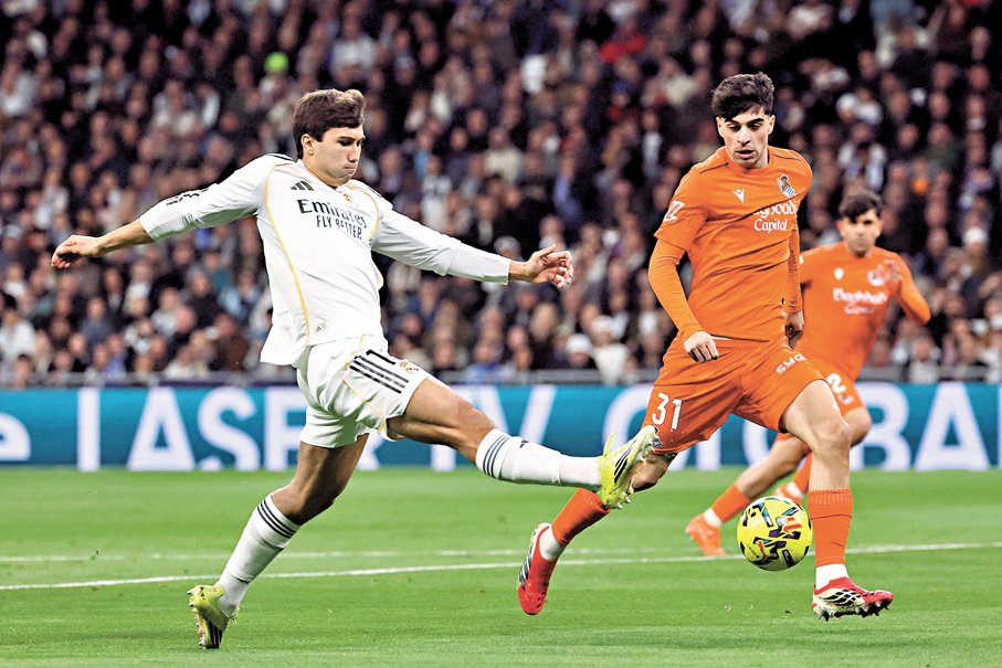 ●干沙路加西亞（左）替皇馬先開紀錄。 法新社