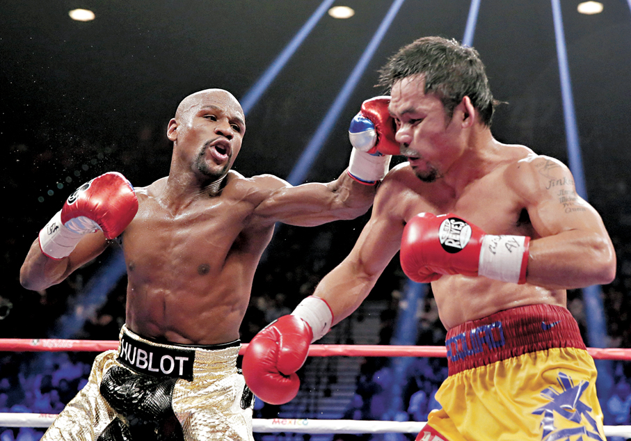 ●美韋達（左）和帕奎奧將重演2015年的世紀之戰。  美聯社