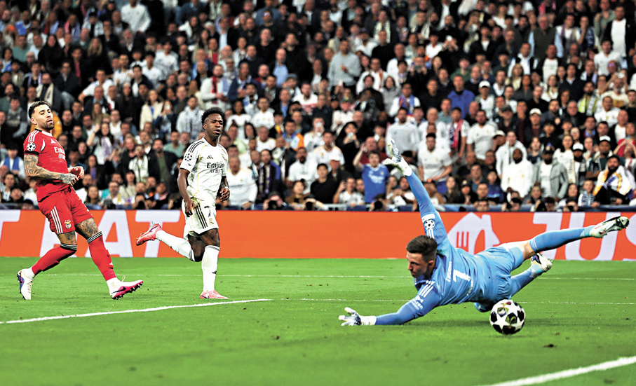 ●雲尼斯奧斯祖利亞（白衫）入球，助皇馬奠勝。 路透社