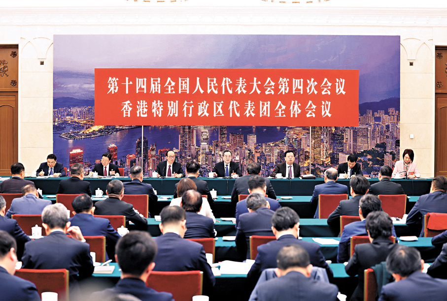 ●3月7日上午，中共中央政治局常委、國務院副總理丁薛祥參加十四屆全國人大四次會議香港代表團審議。 新華社