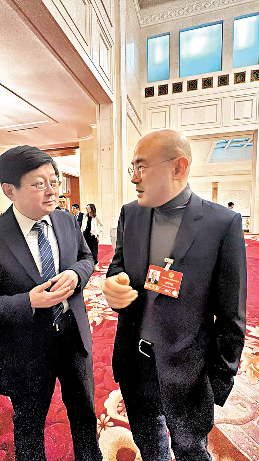 ●港區全國政協委員洪明基（右） 。 香港文匯報記者李暢  攝