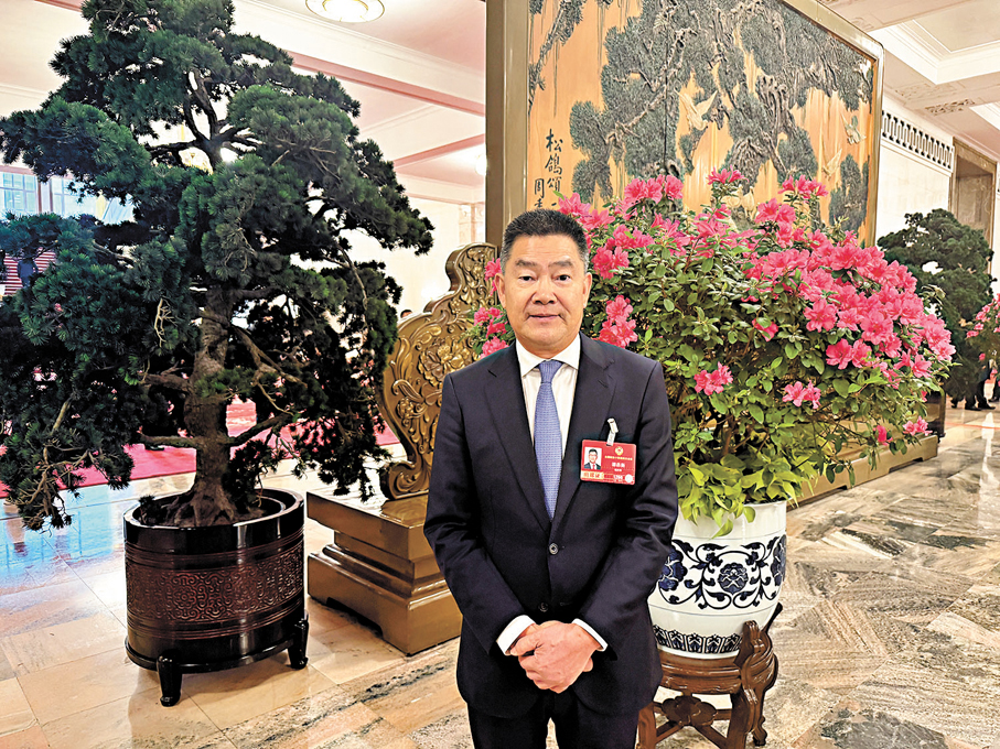 ●譚岳衡指出，香港資本市場應重點推動提升人民幣國際化程度。 香港文匯報記者全子懿  攝