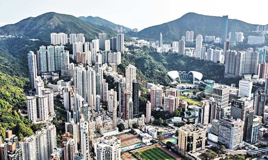 ●減息周期下，香港本地公用股受投資者青睞。圖為灣仔/銅鑼灣一帶。 中通社