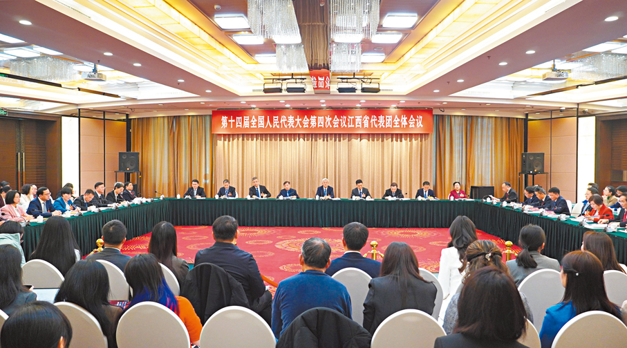 ●日前，十四屆全國人大四次會議江西代表團舉行全體會議，向境內外記者開放團組。 香港文匯報記者黃慧  攝