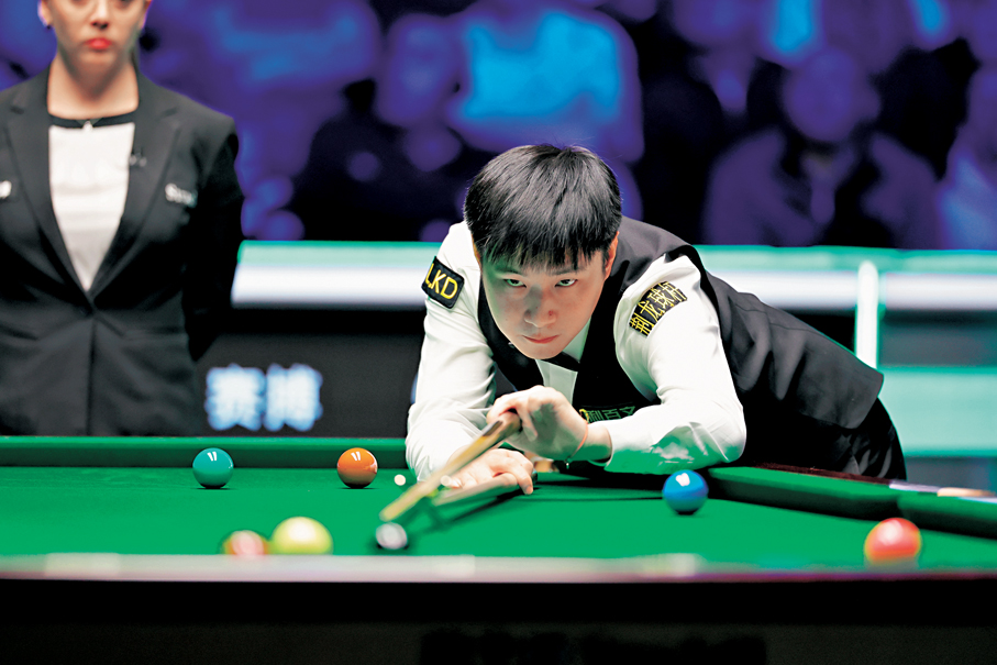 ●趙心童在比賽中。  新華社