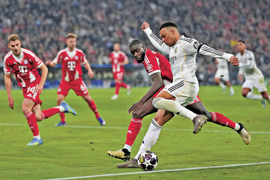 ●基利安麥巴比（右）射入一球，一度助皇馬領先。 美聯社