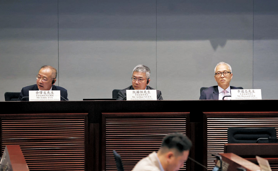 ●左起：余偉文、阮國恒和李達志。   香港文匯報記者萬霜靈  攝