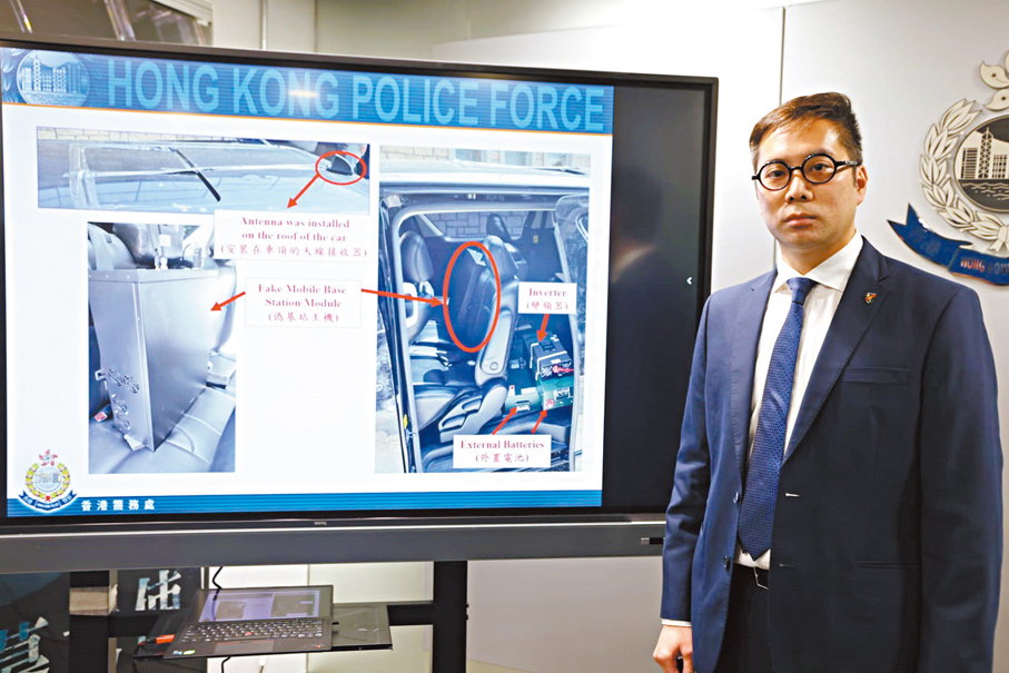 ●警方在兩名疑犯的私家車內檢獲偽基站發射裝置。香港文匯報記者劉友光  攝