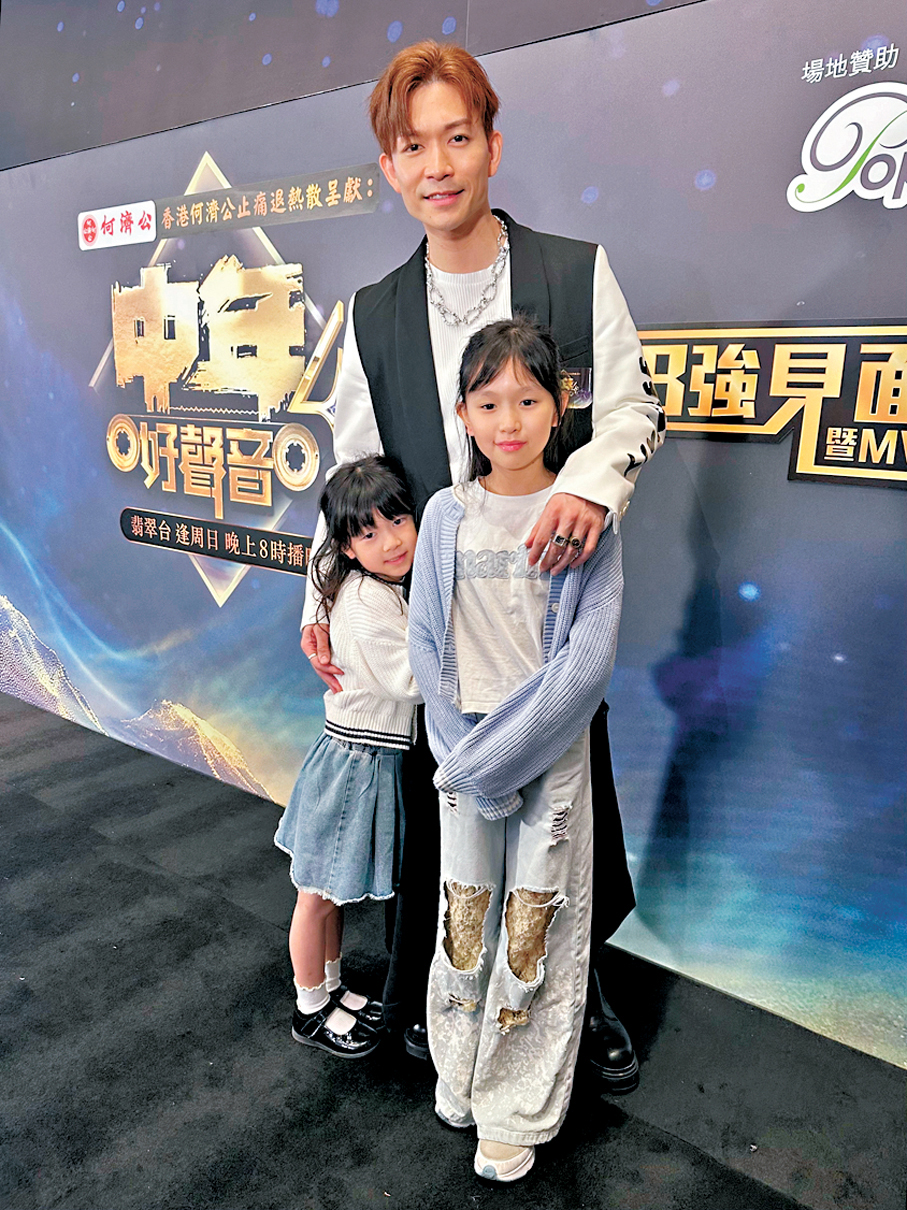 ●周志康的兩個女兒到場。 香港文匯報記者子棠 攝