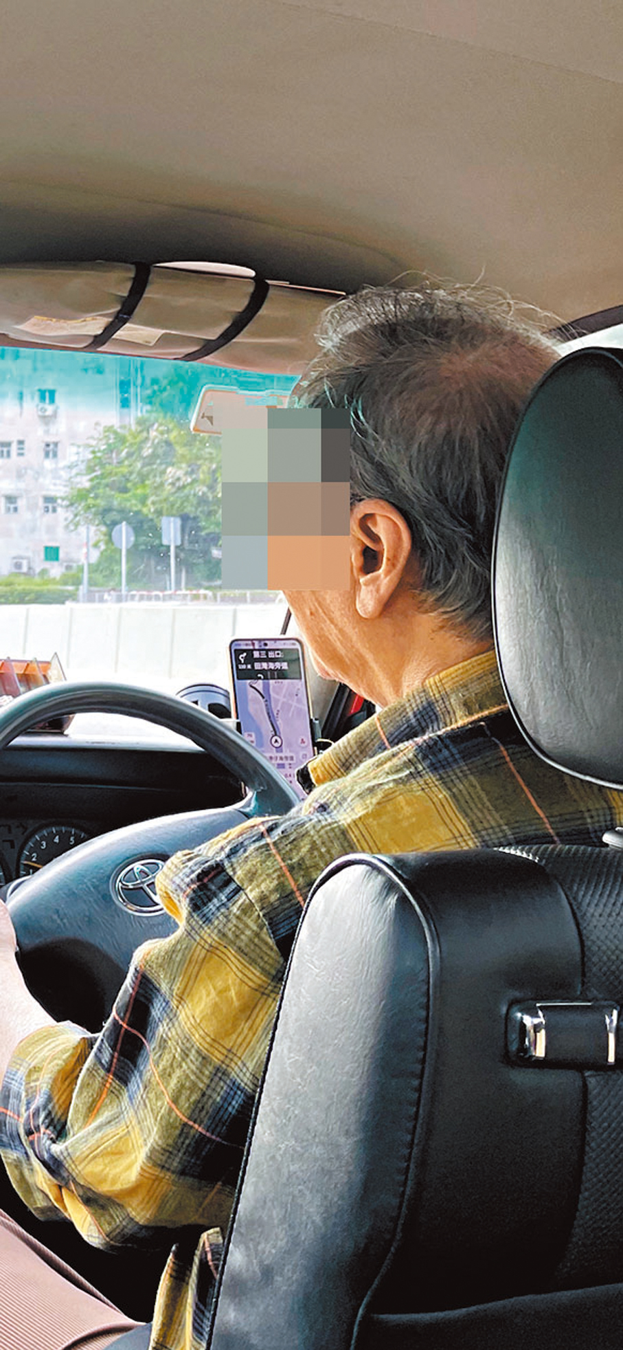 ●網約車司機。香港文匯報記者吳健怡  攝