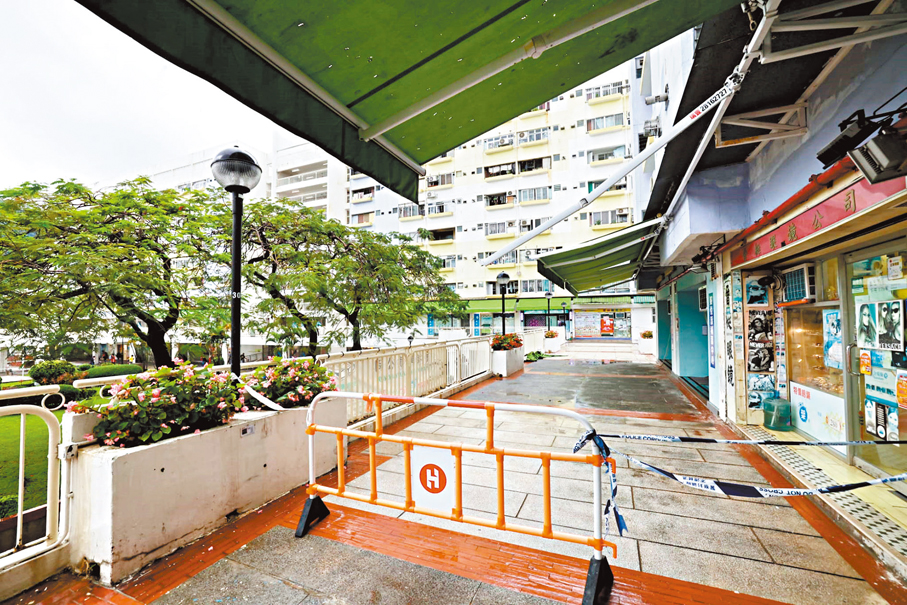●警方封鎖墮樓現場調查。   香港文匯報記者劉友光  攝