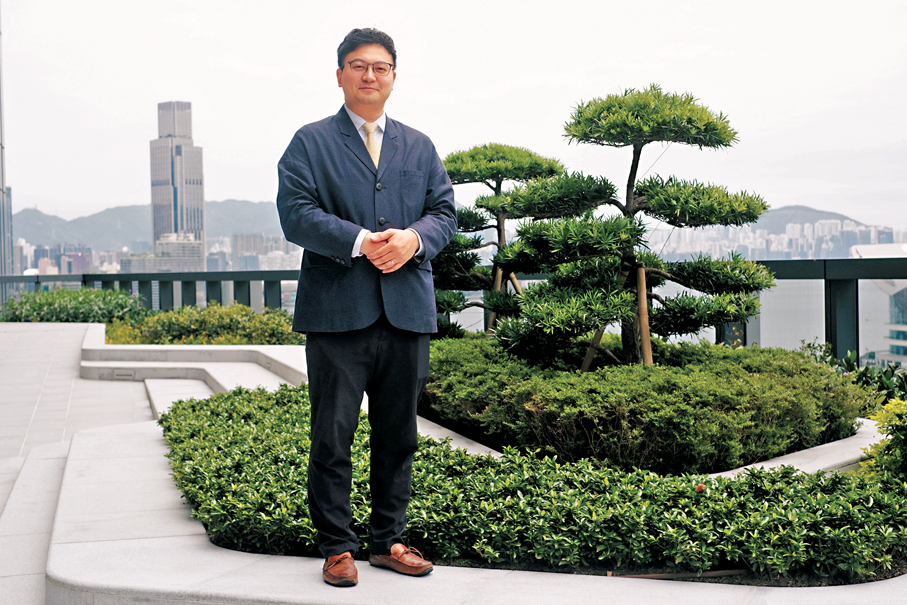 ●梁進接受香港文匯報專訪。   香港文匯報記者涂穴  攝
