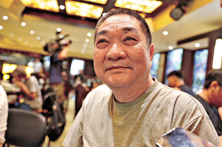 ●的士司機鄺先生專程由筲箕灣到場。香港文匯報記者鍾靜雯  攝