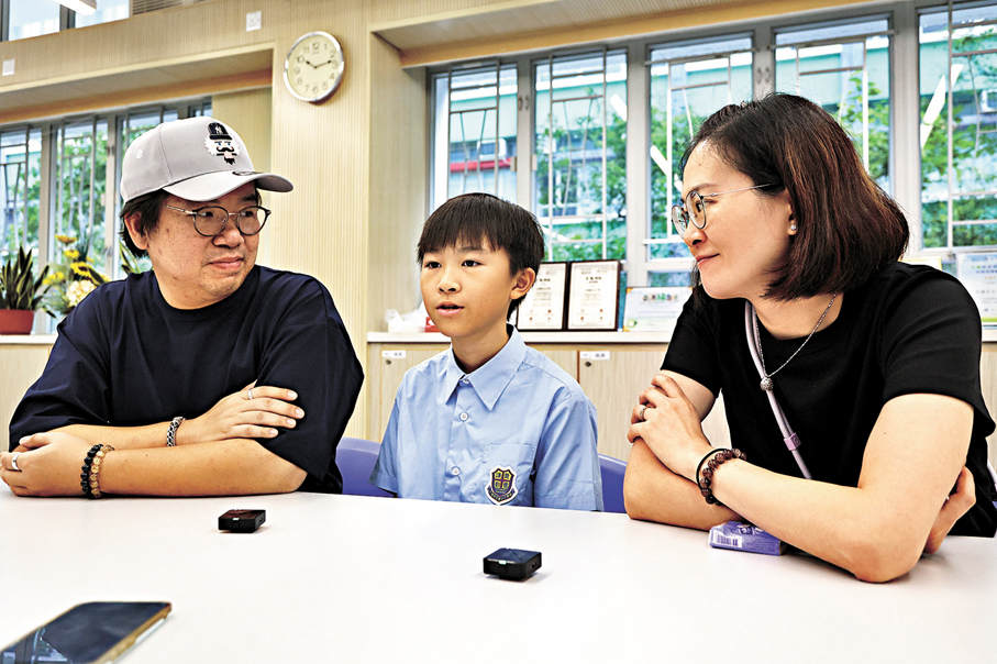●李彥璋一家三口。 香港文匯報記者黃艾力  攝