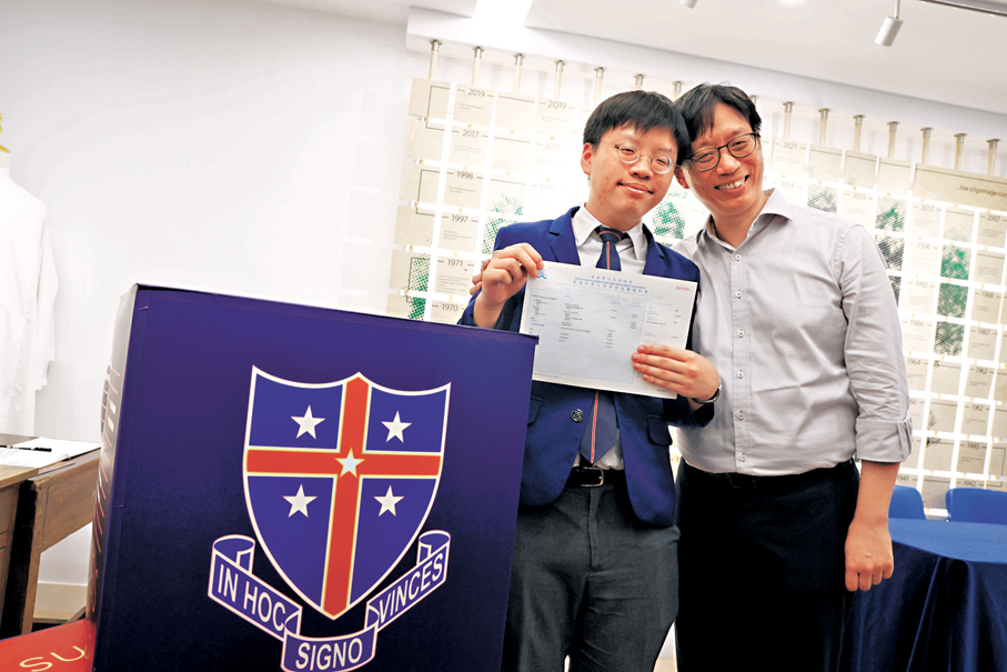 ●鄭子絃及其父親。 香港文匯報記者萬霜靈  攝