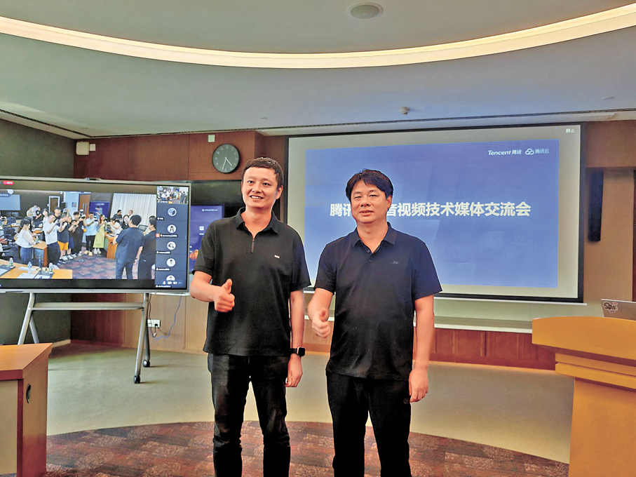 ●騰訊雲李郁韜（左） 香港文匯報記者石華  攝