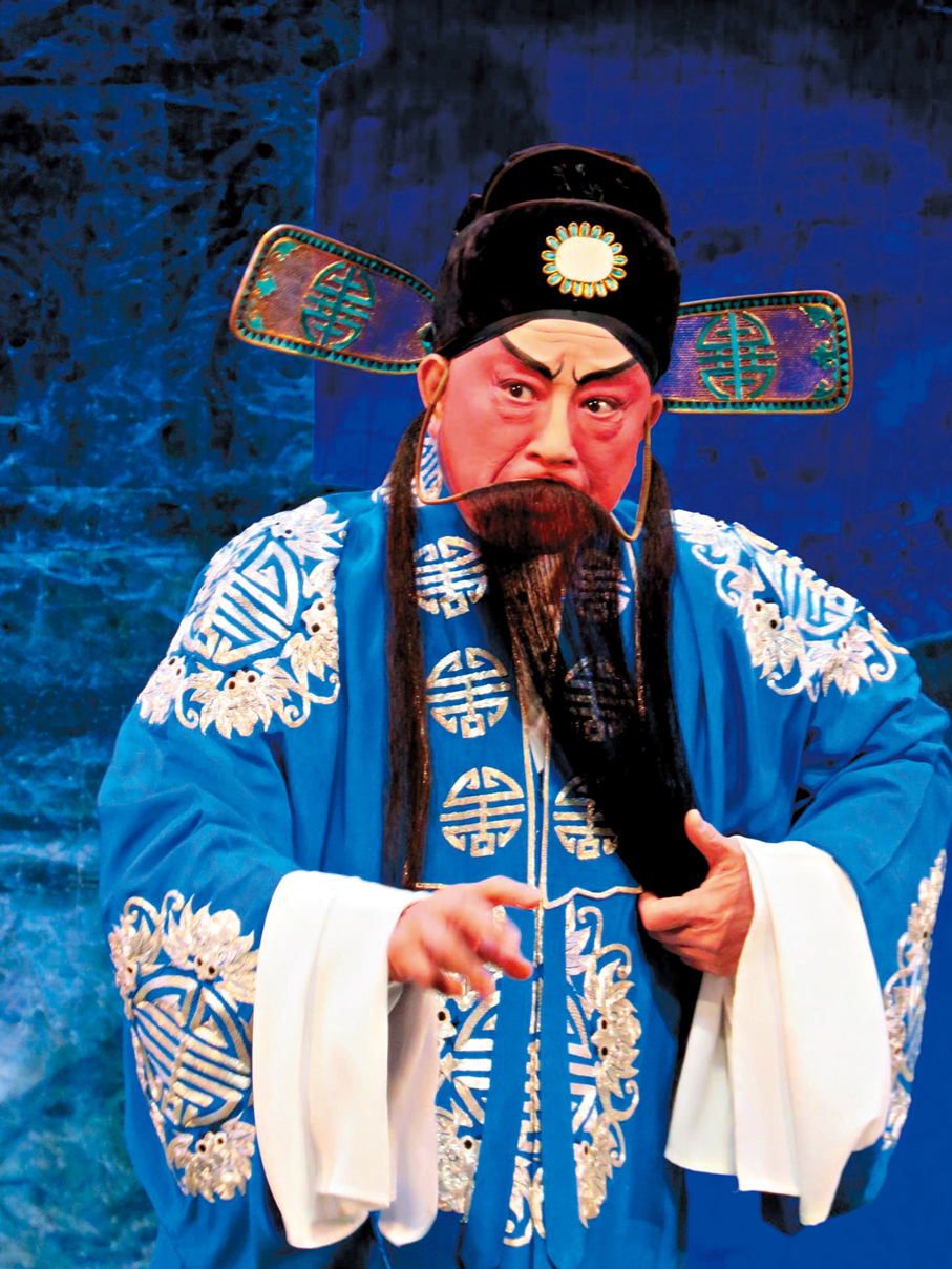 ●廖國森演時吉。