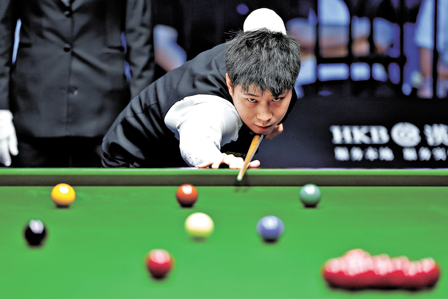 ●趙心童完勝高陽，順利晉級32強。   新華社