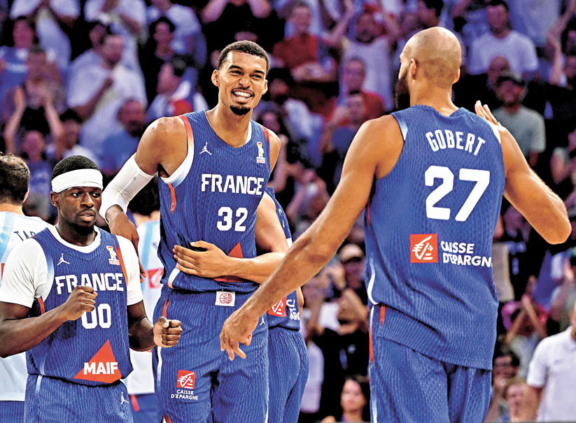 ●雲班亞馬（中）有望將國家隊領袖氣場帶到NBA新球季。 資料圖片