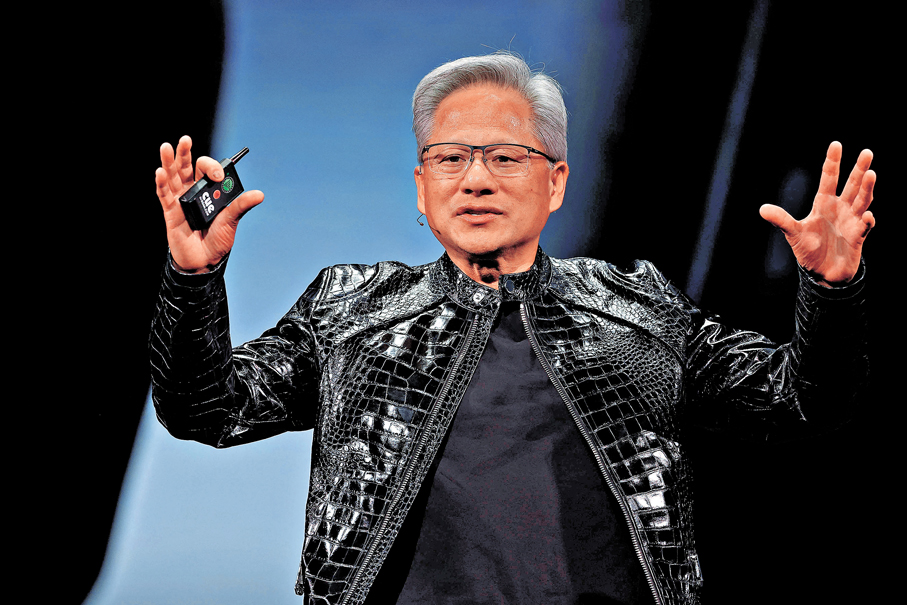 ●黃仁勳在美國洛杉磯舉行的科技峰會上，突然接到美國總統特朗普來電。 法新社