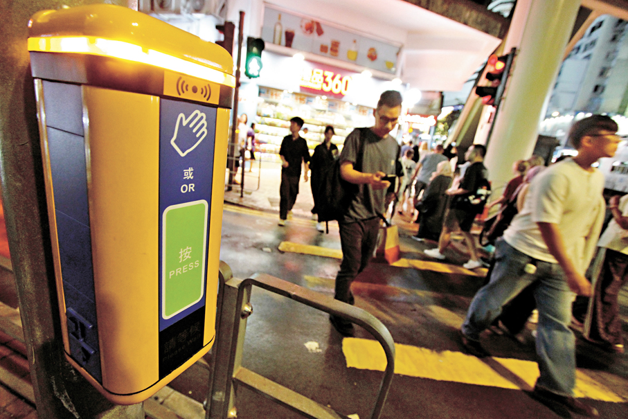 ●截至今年8月，全港四成行人過路處已換上新一代發聲裝置。 香港文匯報記者黃艾力  攝